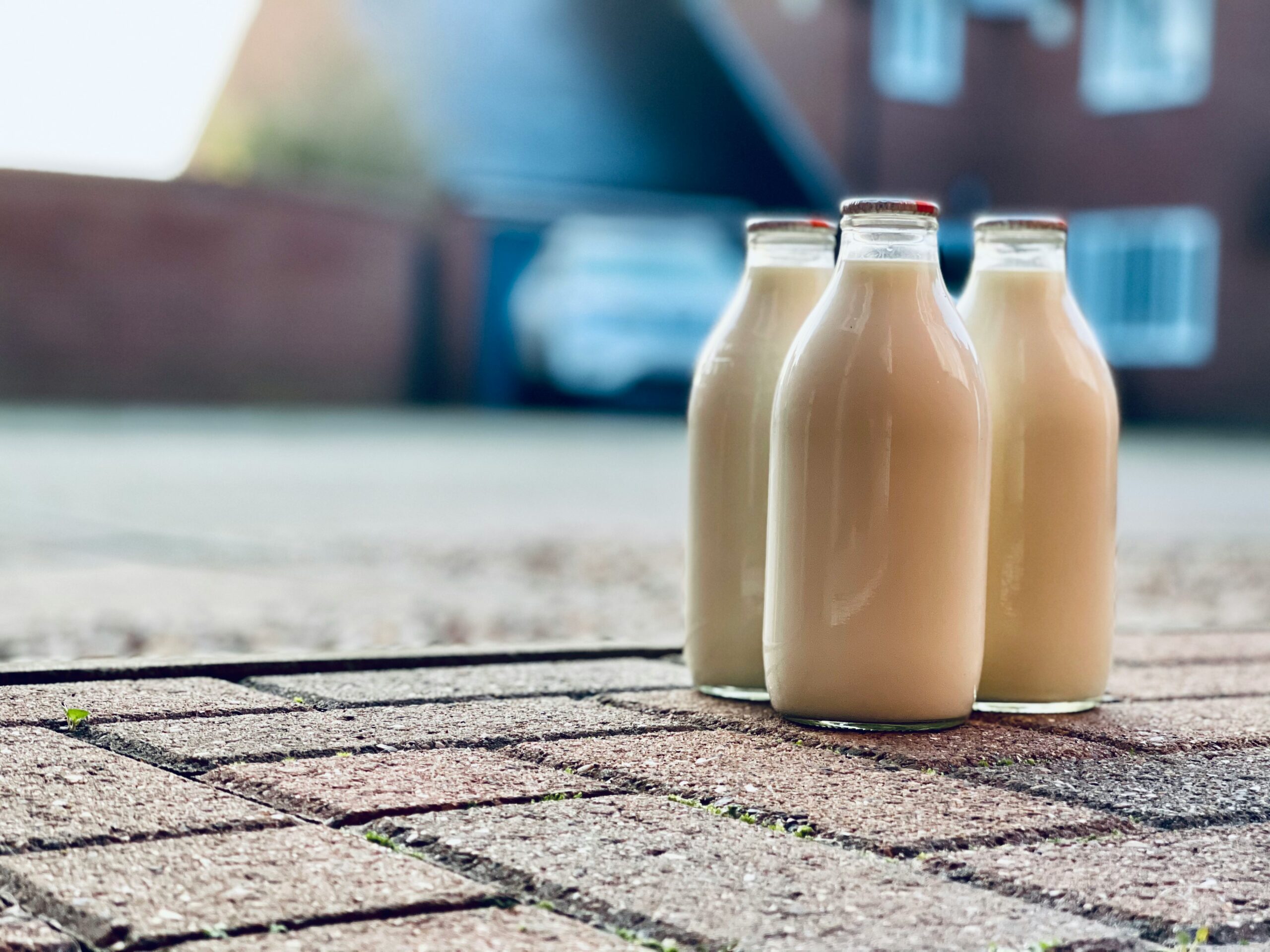 Raw Milk Bottles on porch